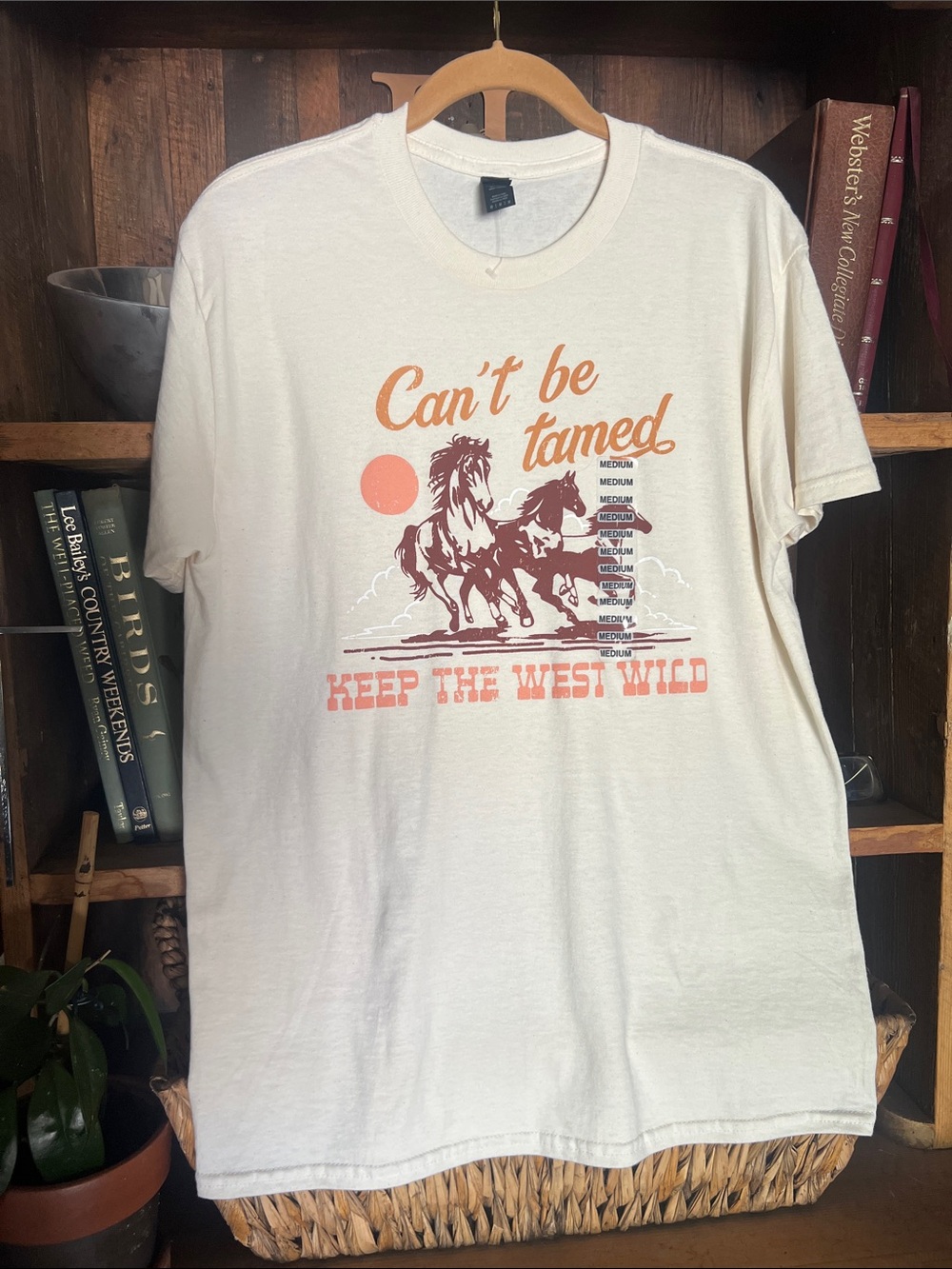 Cream Graphic Tee with Rust and Coral Cowboy Print